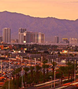 the las vegas strip from a distant viewpoint at sunset