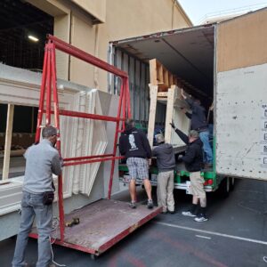 pyramid logistics team moving a film industry set from truck