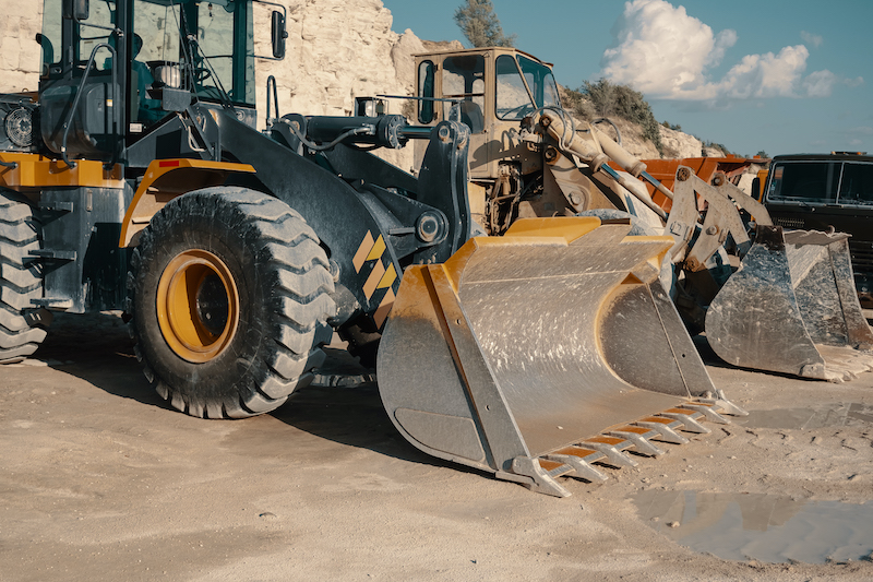 Heavy machinery in quarry. Building materials mining