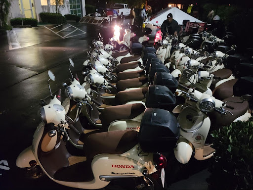 Early morning view of Pyramid Logistics carefully unloading the American Honda Scooters for the 2023 Rose Parade.